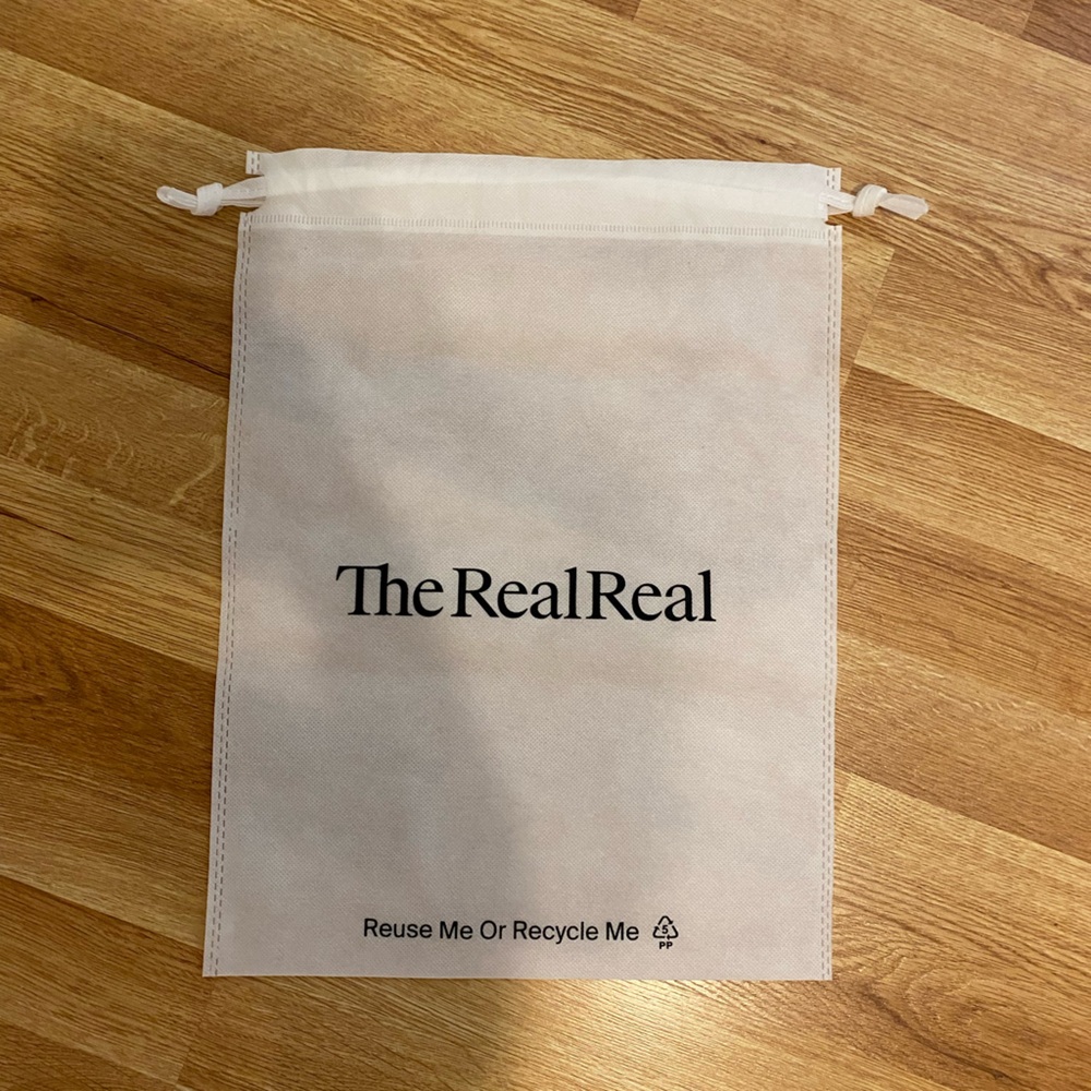The Real Real travel clothing bag